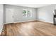 Bright and airy living room with laminate floors, neutral walls, and natural light at 929 N Beville Ave, Indianapolis, IN 46201