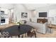 Inviting living room featuring high ceilings, modern furniture, and hardwood floors at 929 N Beville Ave, Indianapolis, IN 46201