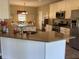 Modern kitchen with stainless steel appliances, granite countertops, and a breakfast bar at 1002 Plummer Rd, Martinsville, IN 46151
