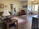 Inviting living room with hardwood floors, comfortable seating, and a view of the front entrance at 1002 Plummer Rd, Martinsville, IN 46151