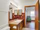 Bathroom features wood vanity, sink, and colorful tile backsplash at 1035 Ina Cir, Franklin, IN 46131