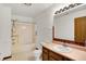 Functional bathroom features a shower-tub combo and a wood vanity at 1035 Ina Cir, Franklin, IN 46131