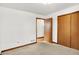 Neutral bedroom features carpeting and closet space at 1035 Ina Cir, Franklin, IN 46131