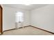 Cozy bedroom with plush carpeting features a window and trim at 1035 Ina Cir, Franklin, IN 46131