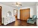 Spacious bedroom with chair, closet, and decorative dresser at 1035 Ina Cir, Franklin, IN 46131