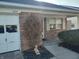 Exterior view of brick home with a front yard and an attached one-car garage, offering comfort and convenience at 1035 Ina Cir, Franklin, IN 46131