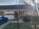Charming brick home featuring an attached garage, manicured landscaping, and inviting curb appeal at 1035 Ina Cir, Franklin, IN 46131