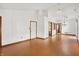 Spacious open-concept living area features high ceilings, modern lighting, and seamless flow into other rooms at 1035 Ina Cir, Franklin, IN 46131