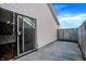 The patio area features a sliding glass door and wooden fence at 1035 Ina Cir, Franklin, IN 46131