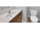 Well-lit bathroom showcasing a sink vanity and toilet at 1059 Sugar Maple Dr, Greenwood, IN 46143