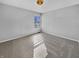 Bright bedroom with new carpet, a window with blinds and natural light at 1059 Sugar Maple Dr, Greenwood, IN 46143