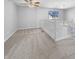 Upstairs landing area with neutral carpet, white railing and natural light at 1059 Sugar Maple Dr, Greenwood, IN 46143