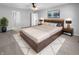 Spacious main bedroom with a comfortable bed, modern decor, and a calm, inviting ambiance at 1059 Sugar Maple Dr, Greenwood, IN 46143