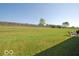 A large backyard for entertaining, gardening and enjoying the outdoors at 11026 Cool Winds Way, Fishers, IN 46037