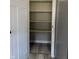 Organized pantry features wood shelves and a stylish plank floor at 1237 E 29Th St, Anderson, IN 46016