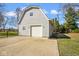 This detached garage in the backyard is a unique building at 1310 Bowman Dr, Greenfield, IN 46140