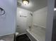 Bright white full bathroom with tub and shower combination at 1344 Tishman Ln # 1344, Indianapolis, IN 46260