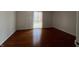Bedroom with hardwood floors and a sliding glass door at 1344 Tishman Ln # 1344, Indianapolis, IN 46260