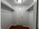 Walk-in closet features built-in shelving and clothing racks at 1344 Tishman Ln # 1344, Indianapolis, IN 46260