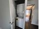 A conveniently located laundry area with a stacked washer and dryer unit at 1344 Tishman Ln # 1344, Indianapolis, IN 46260