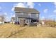 Large backyard featuring a patio with dining and lounge seating at 13615 Moorcroft Dr, Fishers, IN 46037