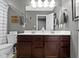 Bathroom featuring a double vanity, a toilet, and modern, neutral tones at 13615 Moorcroft Dr, Fishers, IN 46037