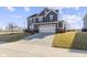 Beautiful home with a two-car garage and a well-maintained lawn and landscaping at 13615 Moorcroft Dr, Fishers, IN 46037
