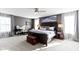Well-lit main bedroom with neutral tones, ceiling fan and beach themed art at 13615 Moorcroft Dr, Fishers, IN 46037