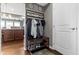 Mudroom with coat rack, storage bench, and shoe storage at 13615 Moorcroft Dr, Fishers, IN 46037