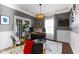A well-lit office space with modern décor, including French doors and elegant lighting at 13615 Moorcroft Dr, Fishers, IN 46037