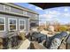 Backyard patio area featuring comfortable outdoor seating and a shade structure at 13615 Moorcroft Dr, Fishers, IN 46037