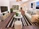 Bright living room with sleek furniture, neutral colors and ample natural light at 1378 South St, Noblesville, IN 46060