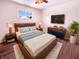 Relaxing main bedroom suite with a plush bed and modern decor at 1378 South St, Noblesville, IN 46060