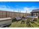 Inviting backyard oasis with a hot tub, a seating area, and a modern fence at 1510 Columbia Ave, Indianapolis, IN 46202