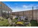 Cozy backyard with a modern lounge area, and lush green turf, perfect for outdoor relaxation at 1510 Columbia Ave, Indianapolis, IN 46202