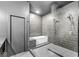 Contemporary bathroom featuring a walk-in shower, soaking tub, and elegant gray finishes at 1510 Columbia Ave, Indianapolis, IN 46202