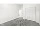 Well-lit bedroom with closet and doorway providing ample sunlight and space at 1510 Columbia Ave, Indianapolis, IN 46202