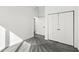 A bright bedroom with closet and doorway providing ample sunlight and space at 1510 Columbia Ave, Indianapolis, IN 46202