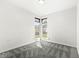 Well-lit bedroom showcasing modern carpet and bright window providing natural light at 1510 Columbia Ave, Indianapolis, IN 46202