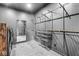 Walk-in closet with hanging racks, wire basket drawers, and a full-length mirror at 1510 Columbia Ave, Indianapolis, IN 46202