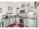 Well-lit kitchen with sleek appliances, ample counter space, and modern cabinets at 1510 Columbia Ave, Indianapolis, IN 46202
