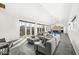Spacious open-concept living room featuring tile floors and expansive windows at 1510 Columbia Ave, Indianapolis, IN 46202