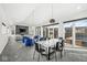Bright and airy living space with a dining area and sliding glass doors to the backyard at 1510 Columbia Ave, Indianapolis, IN 46202