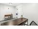 Cozy office with a modern desk and stylish shelving for a comfortable workspace at 1510 Columbia Ave, Indianapolis, IN 46202