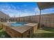 Backyard featuring a modern, wooden-decked pool perfect for relaxation and outdoor enjoyment at 1510 Columbia Ave, Indianapolis, IN 46202