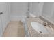 Bathroom with a vanity, granite countertop, and a shower-tub combo at 15704 Millwood Dr, Noblesville, IN 46060