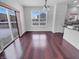 Bright dining area with hardwood floors, natural light, and sliding glass doors to the backyard at 15704 Millwood Dr, Noblesville, IN 46060