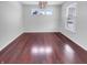 Bright dining room with modern lighting and hardwood floors, perfect for hosting gatherings at 15704 Millwood Dr, Noblesville, IN 46060
