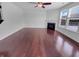 Bright living room with hardwood floors, modern fireplace, and abundant natural light, ideal for entertaining at 15704 Millwood Dr, Noblesville, IN 46060