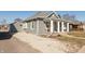 Charming single Gathering home features white trim, stone foundation, and gravel yard at 1718 Gilmore St, Columbus, IN 47201